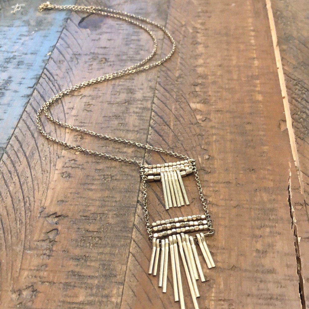 Long gold modern necklace!